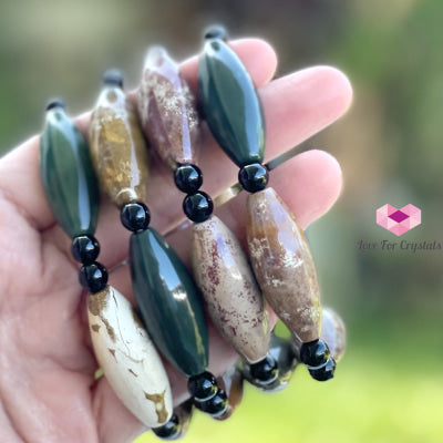 Bloodstone (Long Rice Shaped Beads) With Onyx Bracelet Bracelets