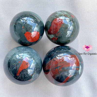 Bloodstone Spheres With Wooden Stand (India)Good Health Crystal